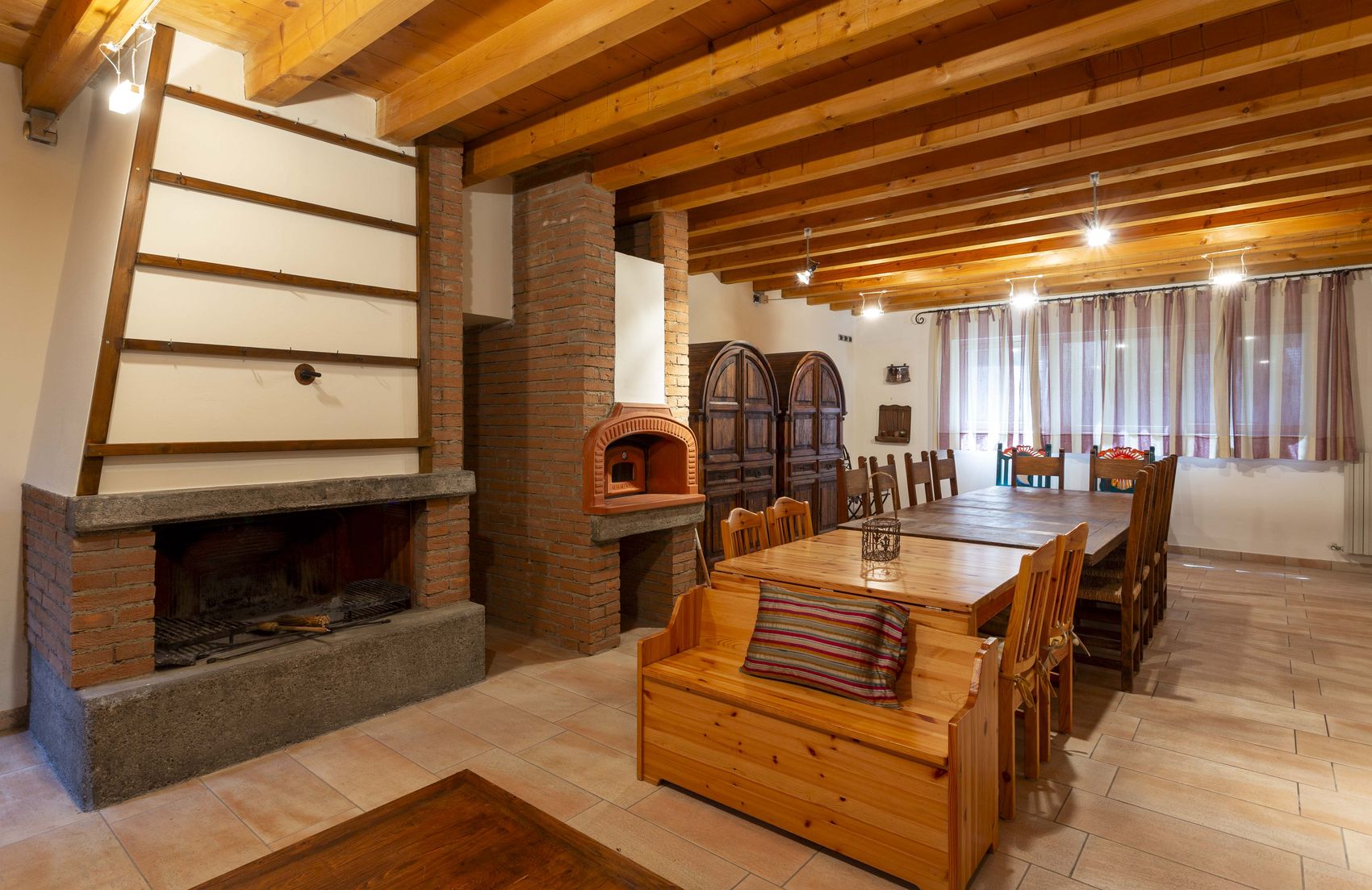 The open hearth and the pizza oven side by side
