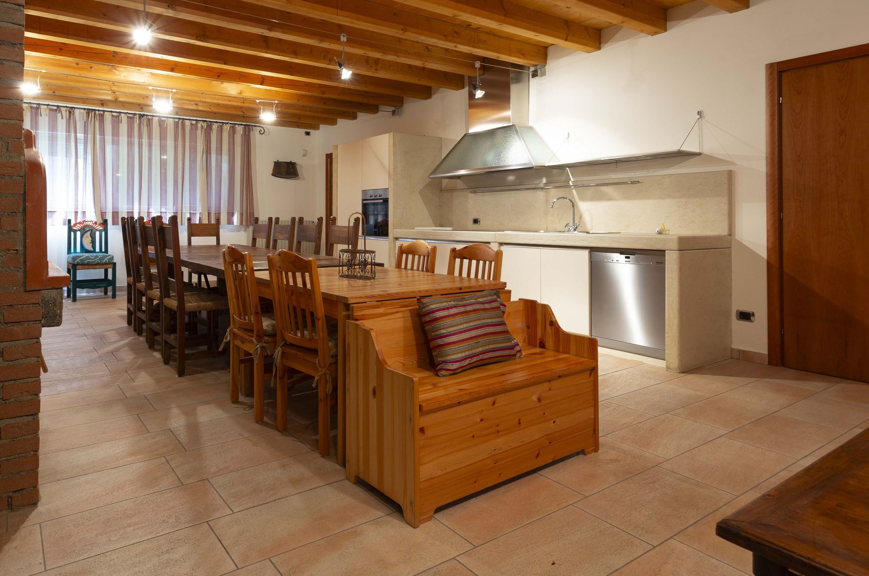 The taverna's own kitchen alongside the dining table